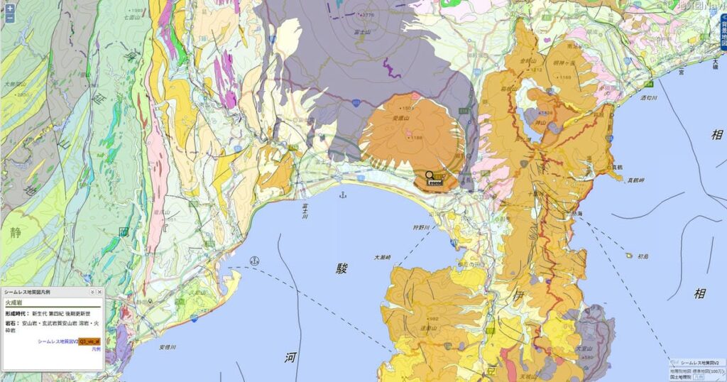 地質図Naviによる沼津市足高付近の地質図。無許可盛り土が確認された地点(黒いピン)と、その周辺に広がる愛鷹山麓の火山灰由来の地層(オレンジ色の範囲)を示している。